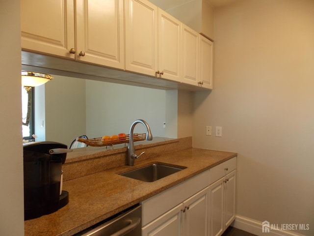 1 Spring St Unit 1205, New Brunswick, NJ 08901 - kitchen featuring a sink, white cabinets, stainless steel dishwasher, and light stone countertops