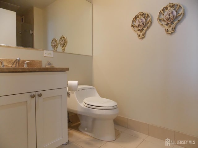 1 Spring St Unit 1205, New Brunswick, NJ 08901 - bathroom featuring tile patterned flooring, vanity, toilet, and a shower