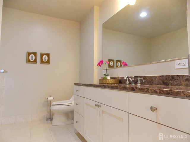 1 Spring St Unit 1205, New Brunswick, NJ 08901 - bathroom featuring vanity, toilet, tile patterned floors, and baseboards
