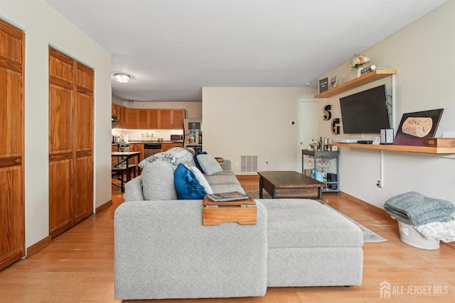 78 Pennsylvania Way N, Brunswick, NJ 08902 - living area featuring light wood finished floors