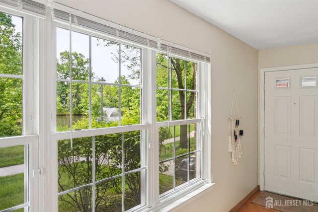 78 Pennsylvania Way N, Brunswick, NJ 08902 - doorway featuring a water view and baseboards