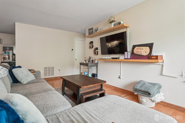 78 Pennsylvania Way N, Brunswick, NJ 08902 - living room with baseboards and wood finished floors