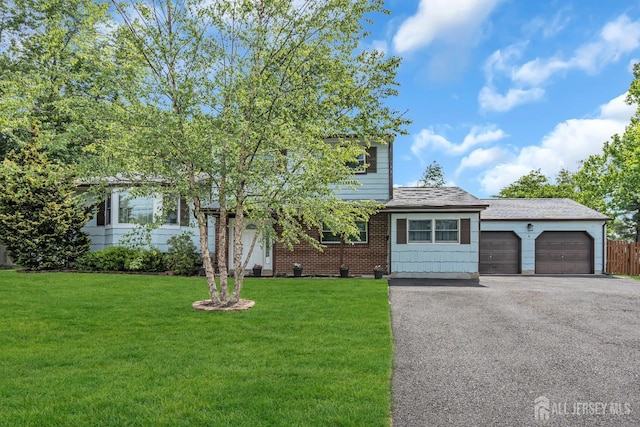 6 Onondaga St, Old Bridge, NJ 08857 - obstructed view of property with asphalt driveway, an attached garage, and brick siding
