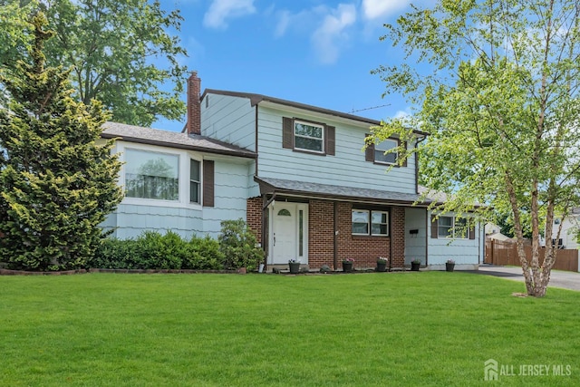 6 Onondaga St, Old Bridge, NJ 08857 - split level home with a chimney and concrete driveway