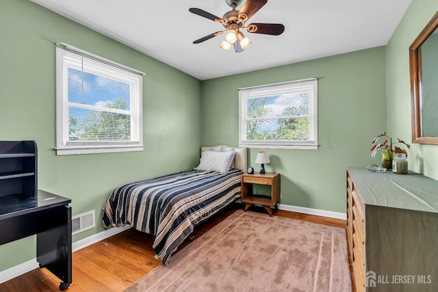 6 Onondaga St, Old Bridge, NJ 08857 - bedroom with wood finished floors, baseboards, and a ceiling fan