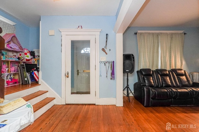 interior space featuring stairs and hardwood / wood-style floors