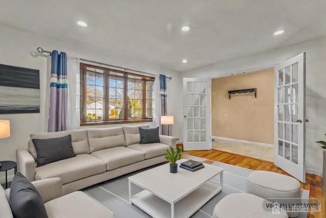 living room featuring french doors and wood-type flooring