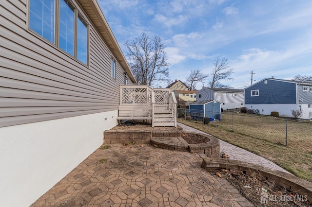 view of patio with a wooden deck