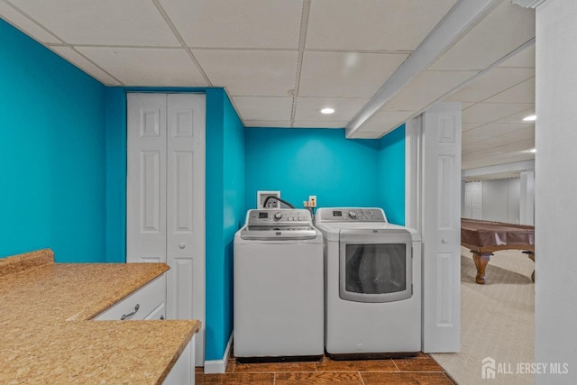 clothes washing area with independent washer and dryer