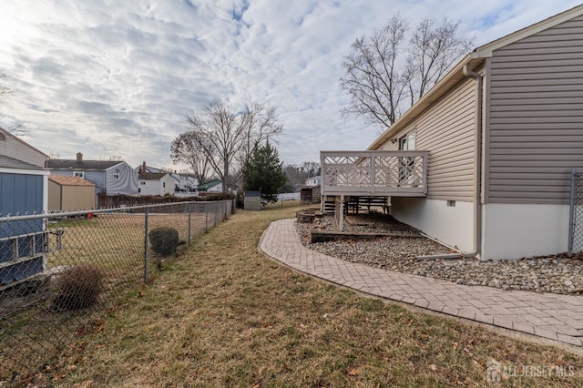 view of yard featuring a deck