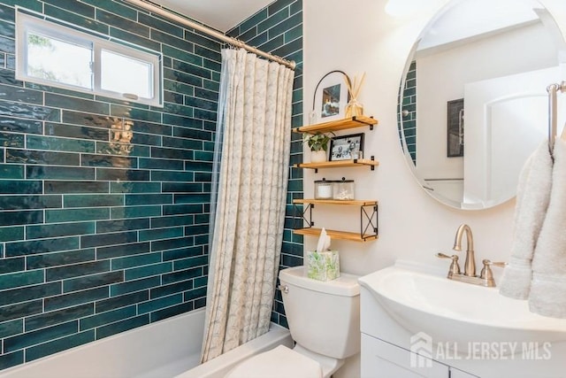 full bathroom with vanity, toilet, and shower / bath combination with curtain