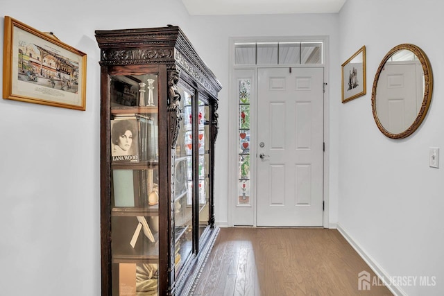 30 Grabowski Dr, Sayreville, NJ 08859 - foyer entrance with wood finished floors and baseboards