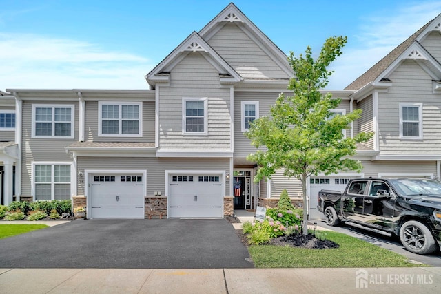 30 Grabowski Dr, Sayreville, NJ 08859 - craftsman house featuring a garage and asphalt driveway