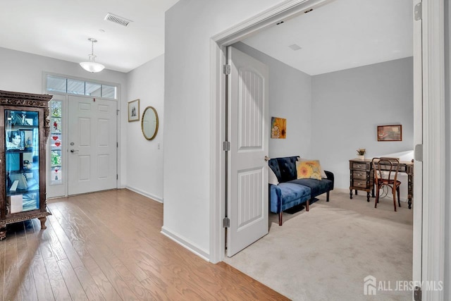 30 Grabowski Dr, Sayreville, NJ 08859 - entrance foyer featuring light wood-type flooring and baseboards