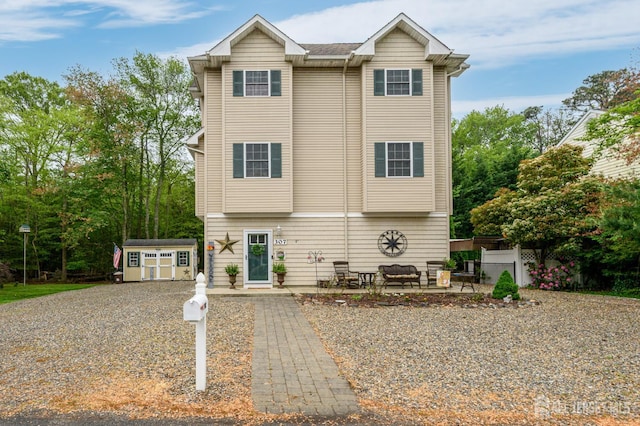 307 Cedar Dr, Lacey, NJ 08734 - view of front facade with a patio area and outdoor lounge area