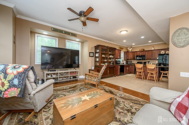 307 Cedar Dr, Lacey, NJ 08734 - living room with ornamental molding, ceiling fan, recessed lighting, and light wood finished floors