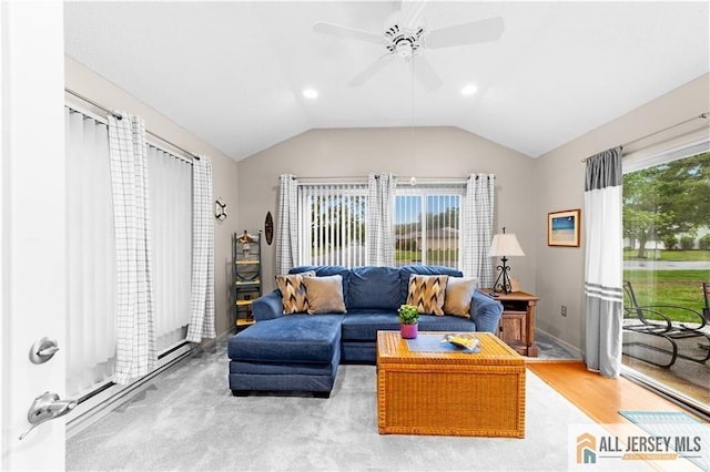 living area with vaulted ceiling, a ceiling fan, baseboards, recessed lighting, and wood finished floors