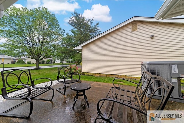 view of patio with central AC