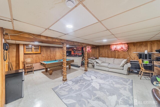 playroom with a paneled ceiling, billiards, and wood walls