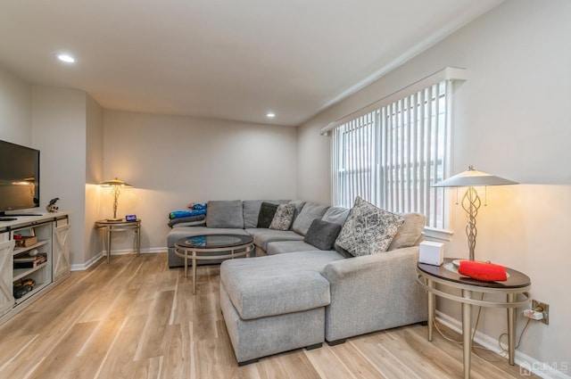 7 Sherbone Pl, Sayreville, NJ 08859 - living area featuring baseboards, light wood-type flooring, and recessed lighting
