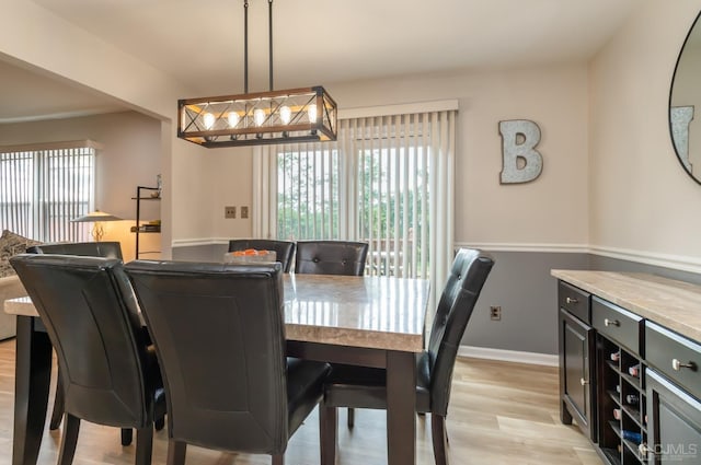7 Sherbone Pl, Sayreville, NJ 08859 - dining area with healthy amount of natural light, light wood-style floors, and baseboards