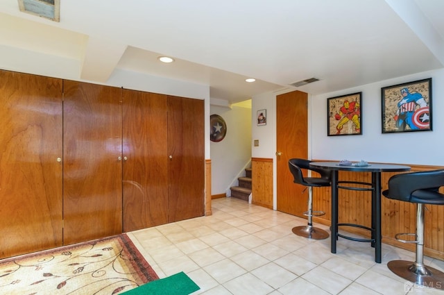 7 Sherbone Pl, Sayreville, NJ 08859 - dining room with stairs, recessed lighting, a wainscoted wall, light tile patterned flooring, and baseboards