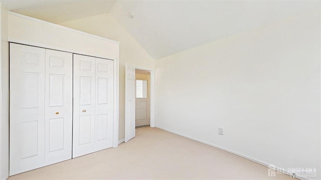 9 Keith Ln, Burlington Twp, NJ 08016 - unfurnished bedroom with lofted ceiling, light colored carpet, a closet, and baseboards