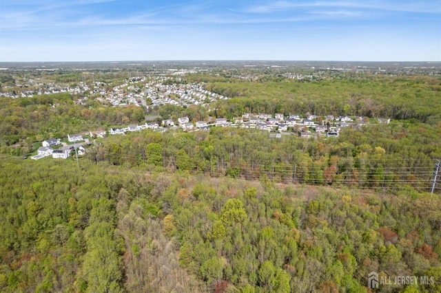 aerial view with a wooded view