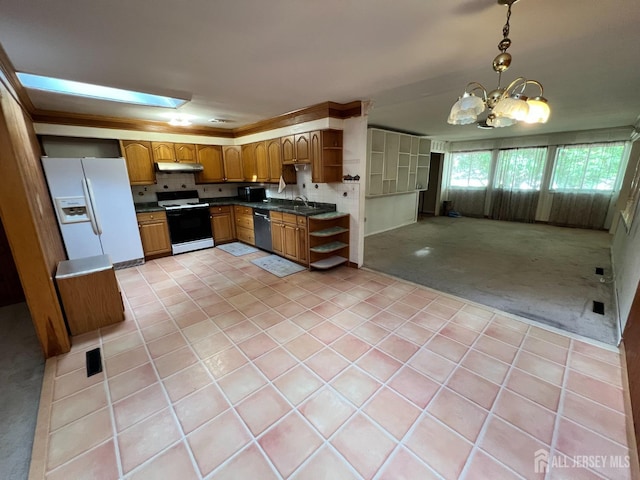 kitchen featuring white refrigerator with ice dispenser, dishwasher, hanging light fixtures, stove, and light carpet