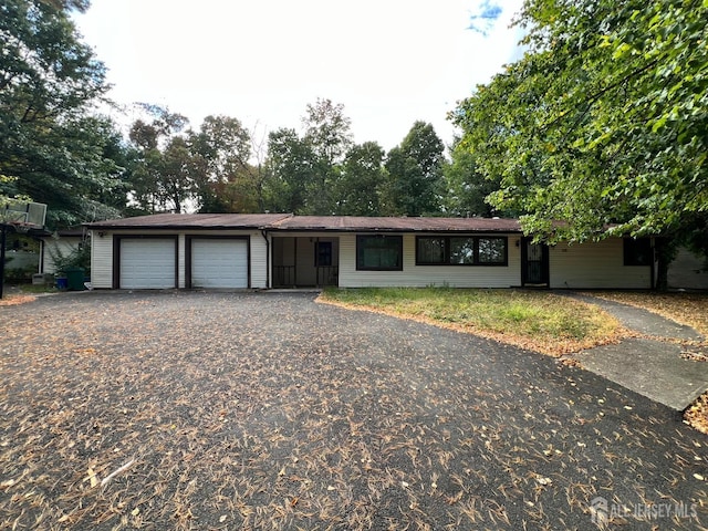 ranch-style home with a garage