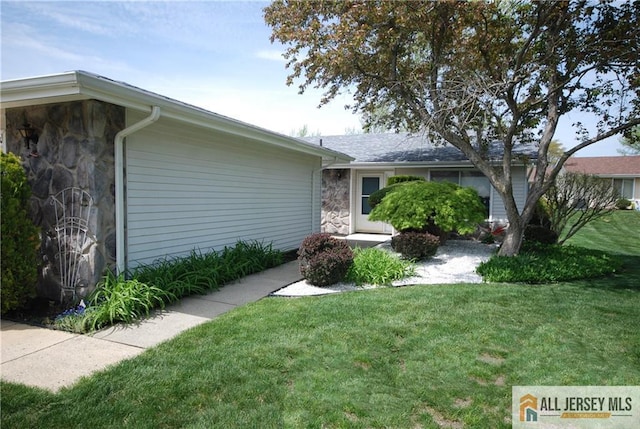 398 Fuchsia Plz Unit C, Monroe, NJ 08831 - exterior space featuring stone siding and a yard