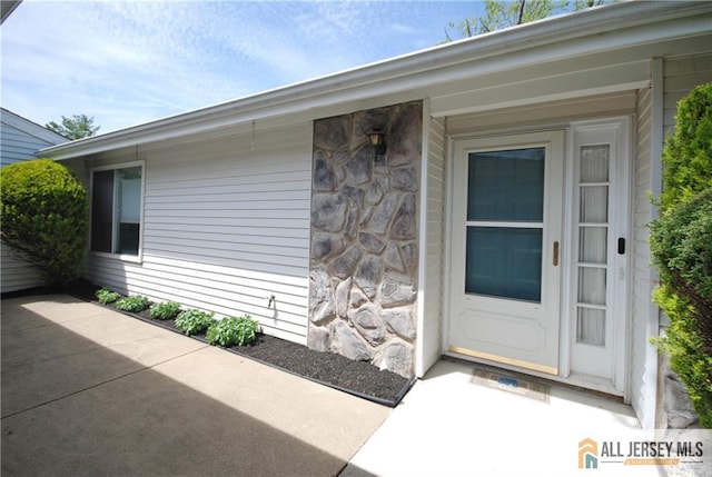 398 Fuchsia Plz Unit C, Monroe, NJ 08831 - entrance to property with stone siding and a patio