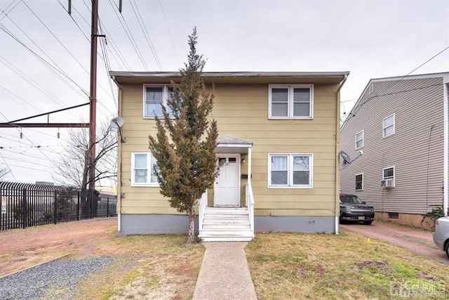 view of front facade with a front yard