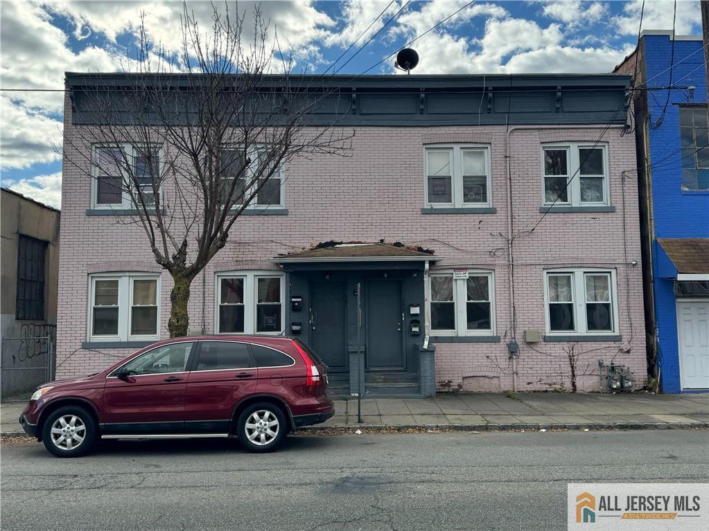 0-397-399 Washington St, Perth Amboy, NJ 08861 - view of front of home featuring brick siding