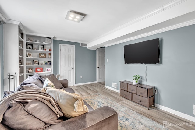 29 Dumas Rd, Old Bridge, NJ 08857 - living area with ornamental molding and light wood-style floors