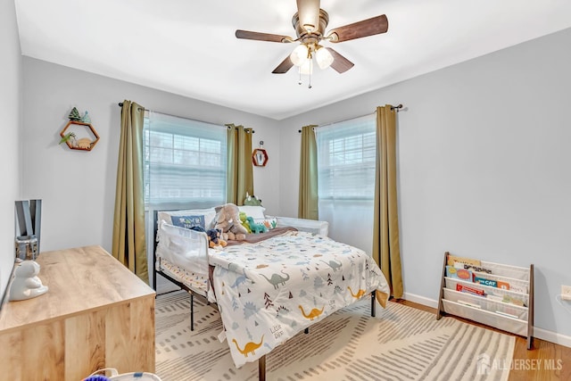 29 Dumas Rd, Old Bridge, NJ 08857 - bedroom with light wood-type flooring and ceiling fan