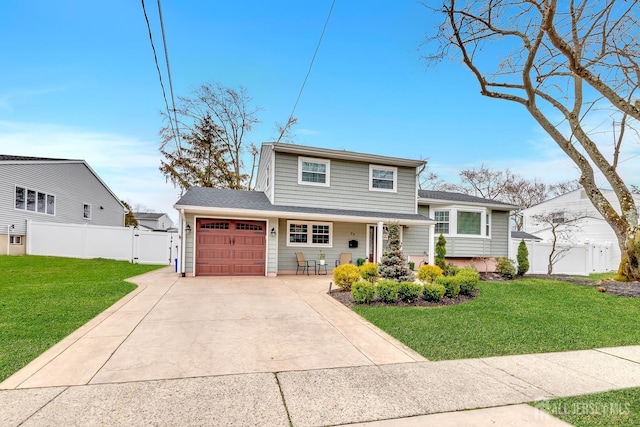 29 Dumas Rd, Old Bridge, NJ 08857 - tri-level home featuring an attached garage, a gate, driveway, and covered porch