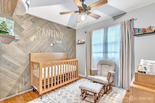 29 Dumas Rd, Old Bridge, NJ 08857 - bedroom featuring a nursery area, a ceiling fan, and wood finished floors