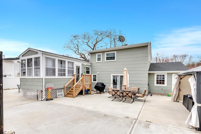 29 Dumas Rd, Old Bridge, NJ 08857 - rear view of property featuring a patio and a sunroom