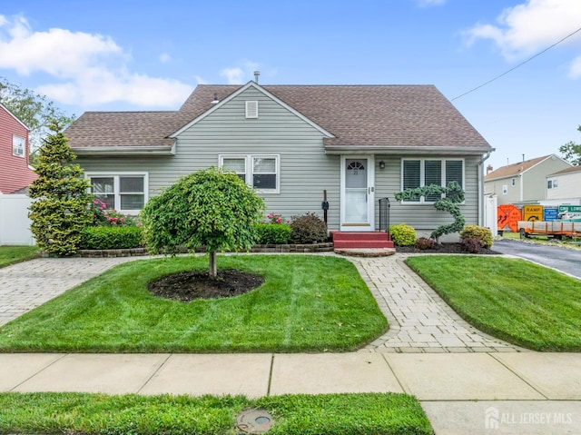 21 Haug St, Union Beach, NJ 07735 - bungalow-style house featuring roof with shingles