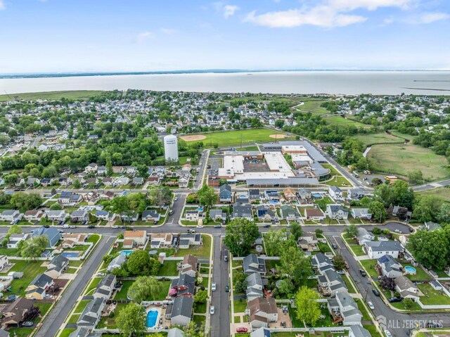 21 Haug St, Union Beach, NJ 07735 - aerial view of property and surrounding area with a nearby body of water and nearby suburban area