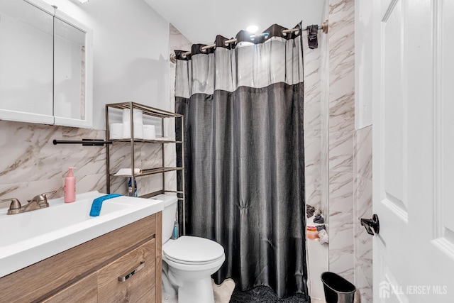 176 Main St, East Brunswick, NJ 08816 - bathroom with vanity, a shower with shower curtain, backsplash, and tile walls