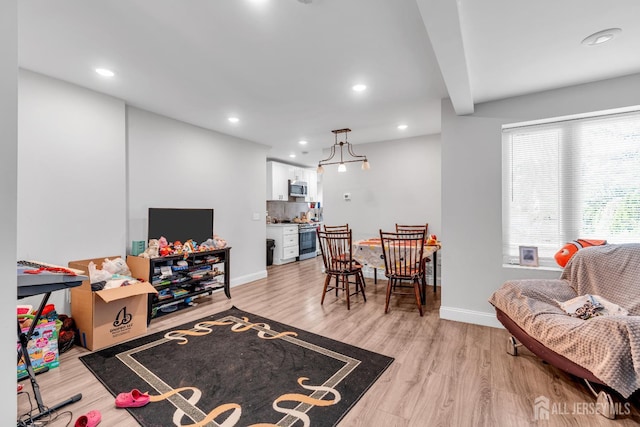 176 Main St, East Brunswick, NJ 08816 - living room featuring light wood-style floors and recessed lighting