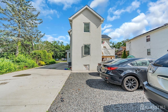 176 Main St, East Brunswick, NJ 08816 - view of home's exterior with stucco siding