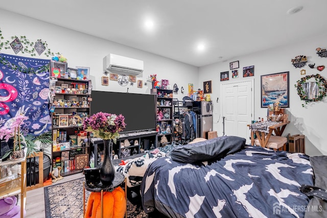 176 Main St, East Brunswick, NJ 08816 - bedroom with a wall unit AC and wood finished floors