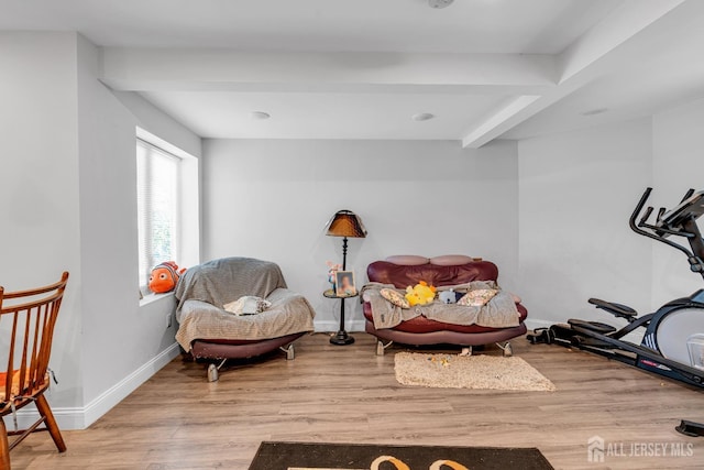 176 Main St, East Brunswick, NJ 08816 - living area featuring wood finished floors and beamed ceiling