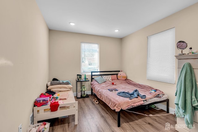 176 Main St, East Brunswick, NJ 08816 - bedroom with wood finished floors and recessed lighting