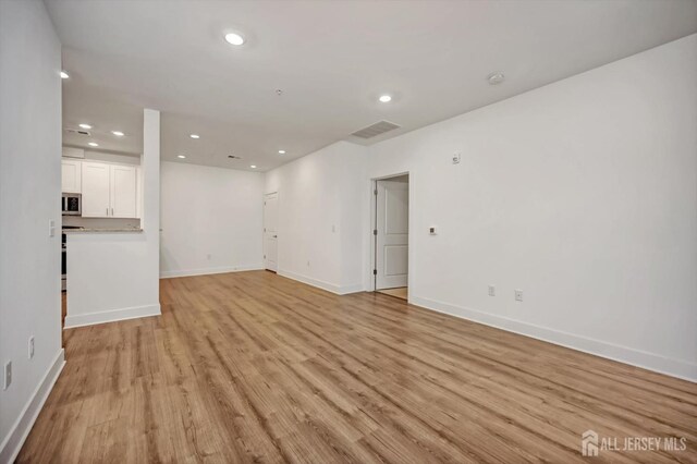 interior space with light hardwood / wood-style floors