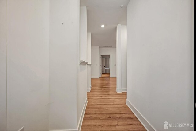 hallway featuring light wood-type flooring