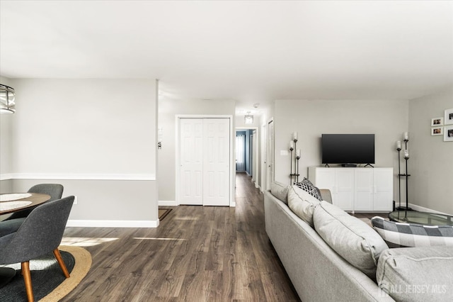 living room featuring dark hardwood / wood-style floors